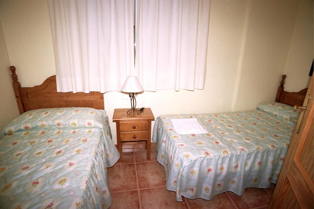 Apartamentos La Casa del Barrio Maro Habitación foto