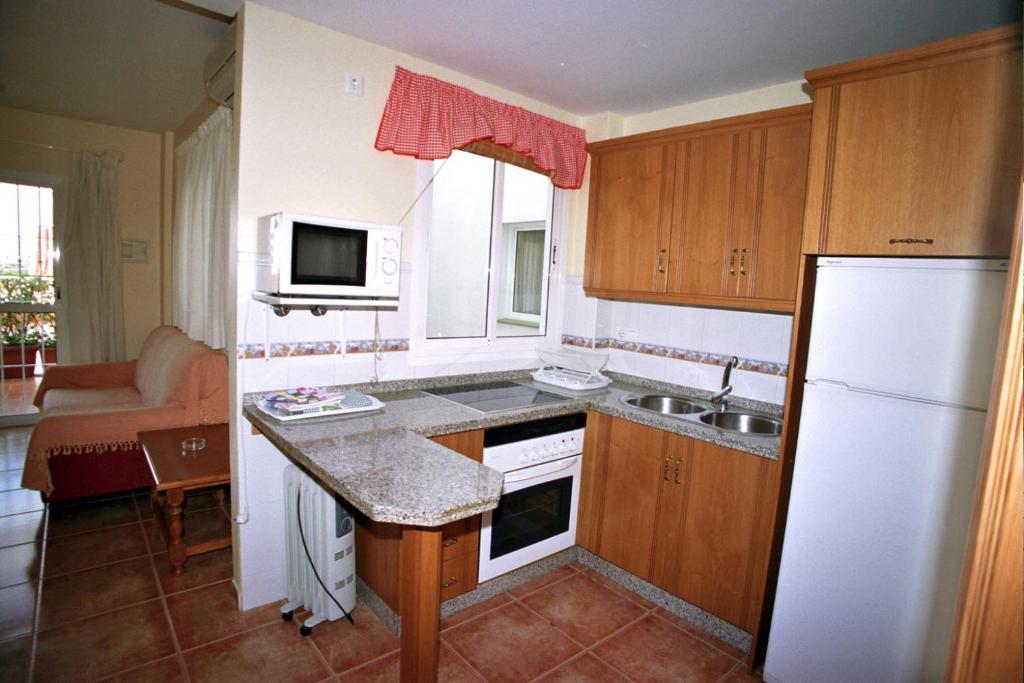Apartamentos La Casa del Barrio Maro Habitación foto