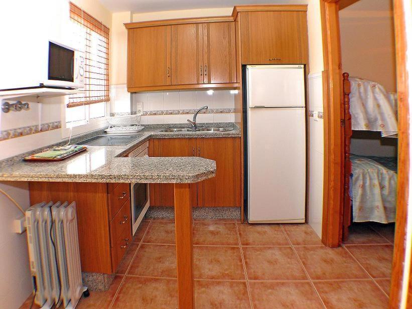 Apartamentos La Casa del Barrio Maro Habitación foto