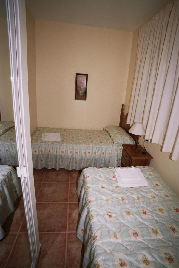 Apartamentos La Casa del Barrio Maro Habitación foto